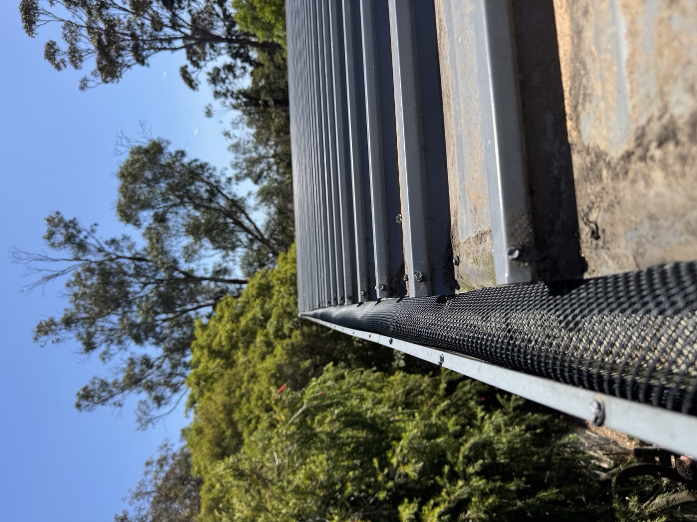 Close-up of aluminium mesh gutter guard