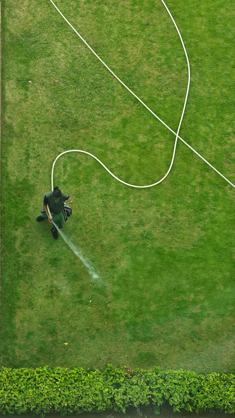 Aerial view of professional lawn watering service